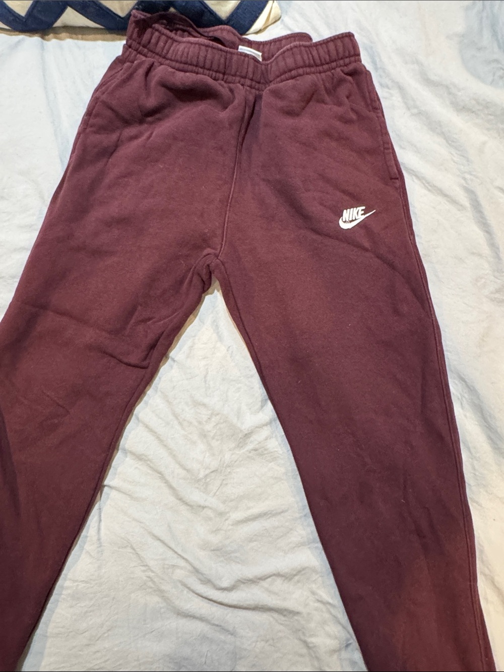 Nike men’s size small Burgundy Joggers with White Swoosh